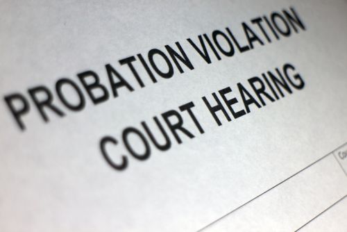 This is a photo of a court document showing a probation violation court hearing